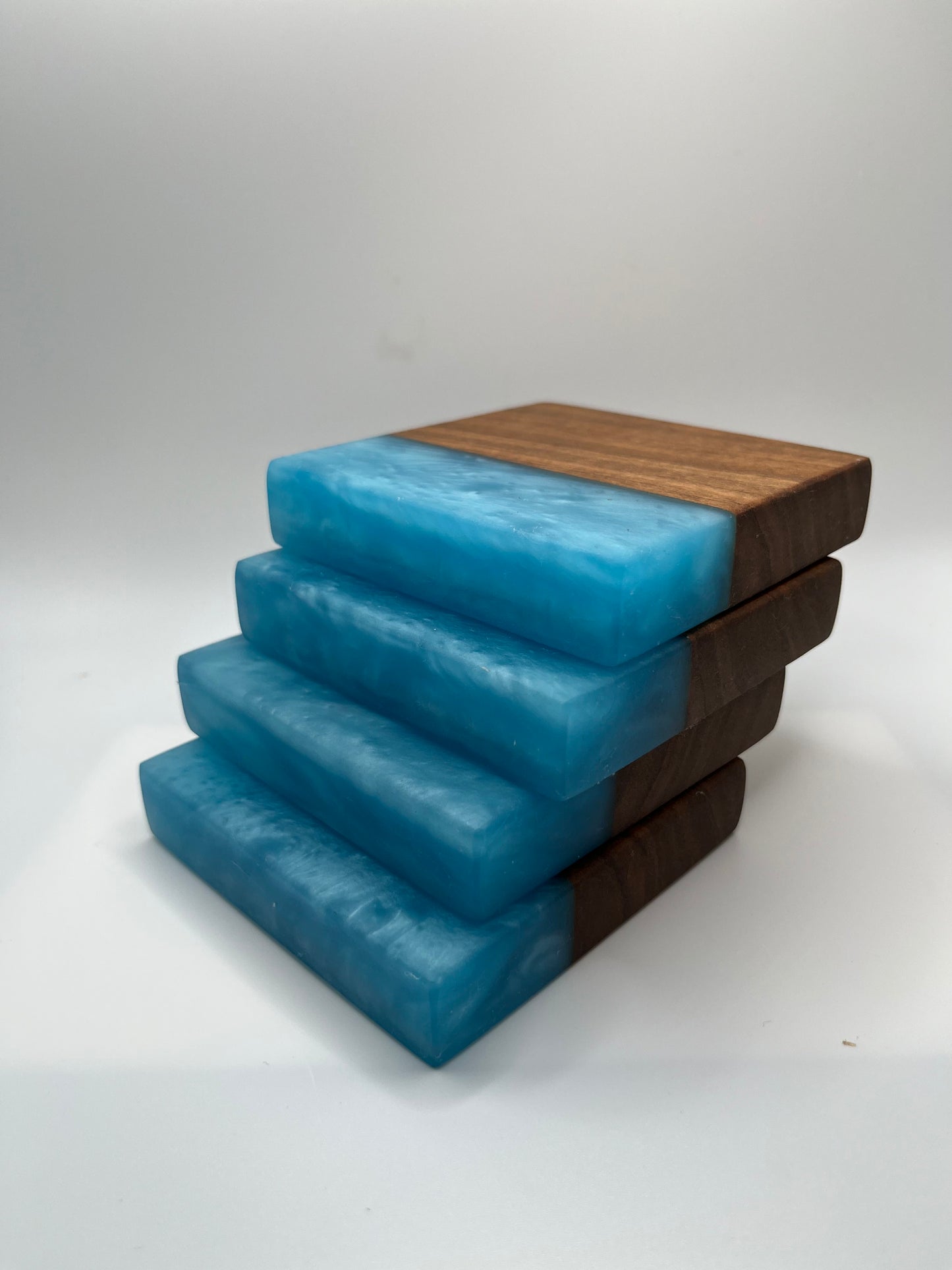 BUTTERNUT AND ELECTRIC BLUE EPOXY COASTERS