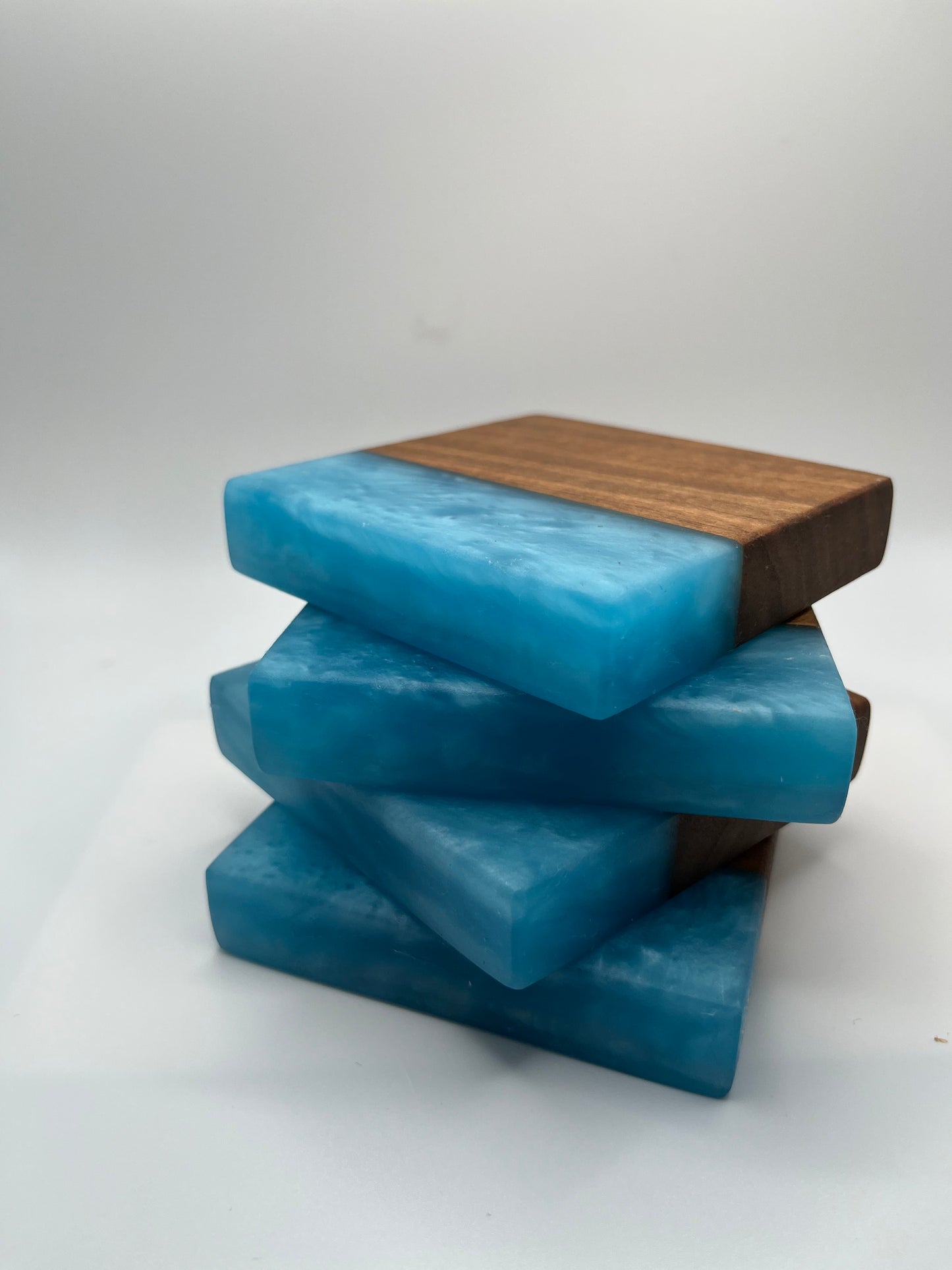 BUTTERNUT AND ELECTRIC BLUE EPOXY COASTERS